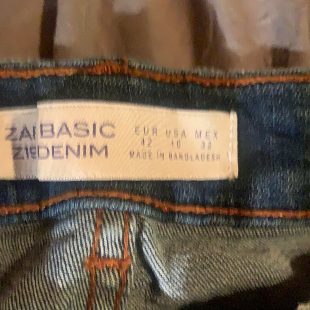 Distressed blue jeans